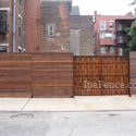 An outstanding ipe fence in a city environment