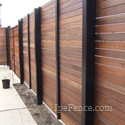 Solid, modern ipe fence