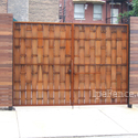 Gate in an ipe fence